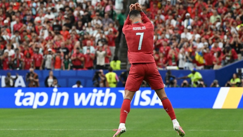 Ronaldo double fires Portugal, Ghana thwart England